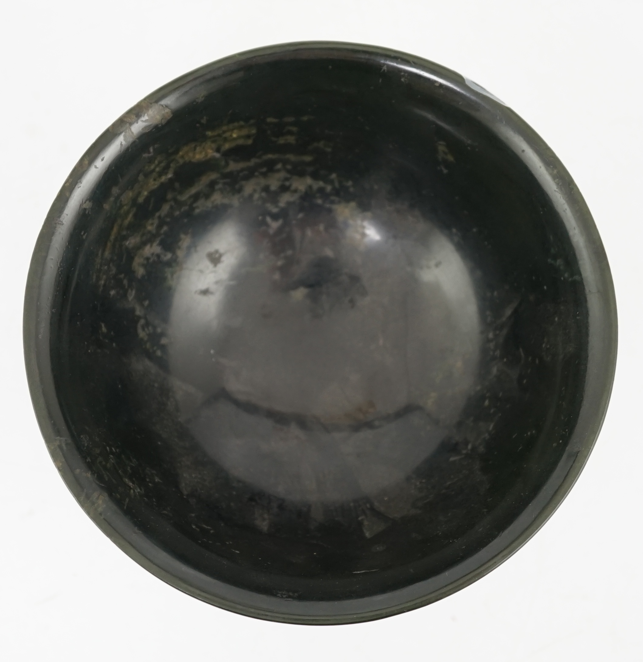 A Chinese dark spinach green jade bowl, engraved Qianlong seal mark but 19th/20th century